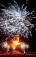 Fireworks before the "Man" burns at Burning Man in Black Rock City Nevada