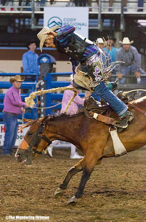 Bronc busting cowboy