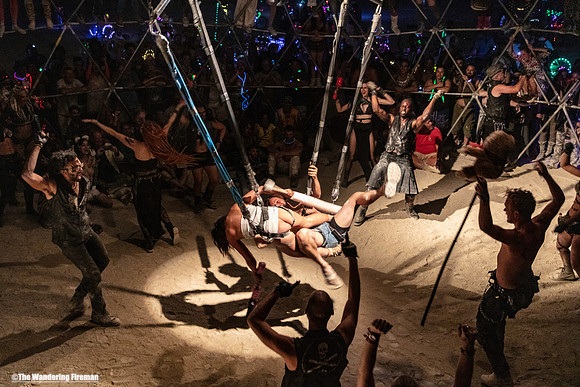 Warriors battle one another in the Thunder Dome of Burning Man in Black Rock City Nevada