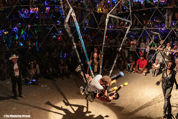 Warriors thrash each other in the Thunder Dome of Burning Man in Black Rock City Nevada