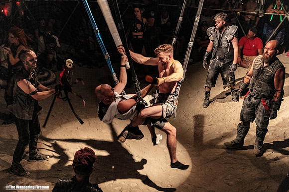 Gladiators tangle in the Thunder Dome of Burning Man in Black Rock City Nevada