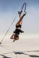 Solo hoop performer on art at Burning Man in Black Rock City Nevada