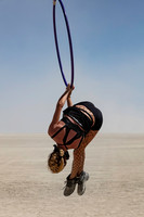 Woman swinging on an art project at Burning Man