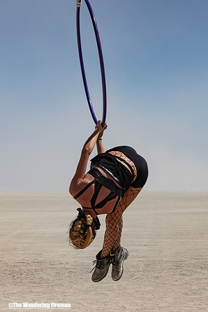 Woman swinging on an art project at Burning Man