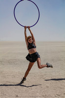 Woman hanging on a hoop at Burning Man in Black Rock City Nevada