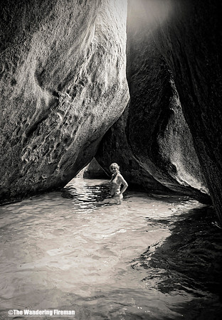 Women in a shallow sea cave