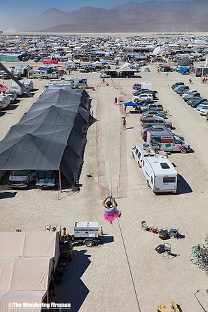 Zipping down the zip line at Burning Man