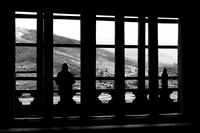Woman in a window in Bhutan.