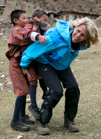 Giving a piggy back ride in Bhutan