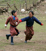 Two children in a Bhutanese schoolyard