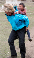 Giving a piggyback ride in Bhutan