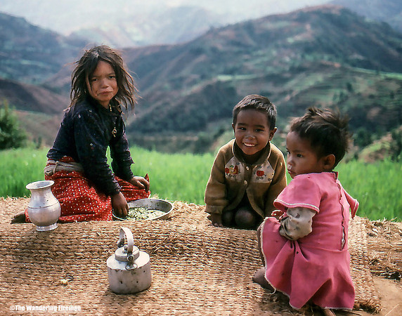 Three young children in the countryside in Nepal