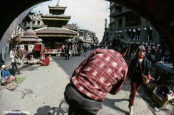 Riding in a bycicle taxi in Kathmandu Nepal