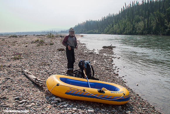 "Preparing to cross the Carcajou River."