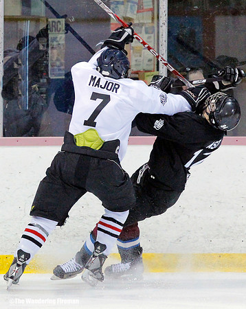 Crushing body check in an ice hockey game