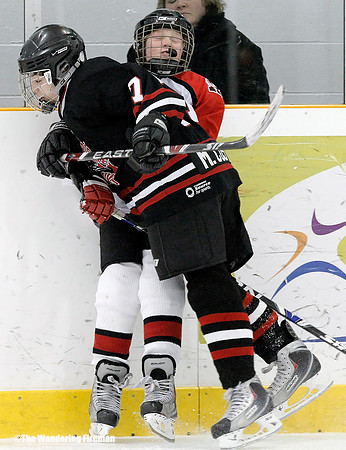 Crushing body check in ice hockey