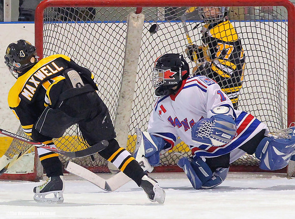 Firing the puck into the upper net