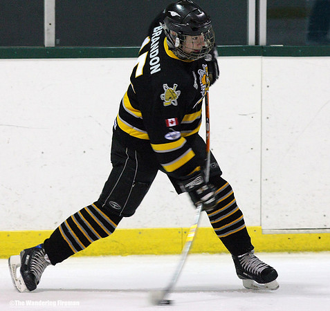 Ice hockey player bending stick
