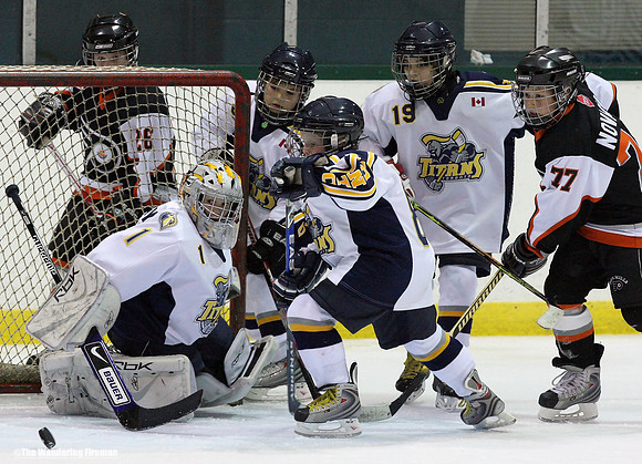 Crowding the net in a hockey game