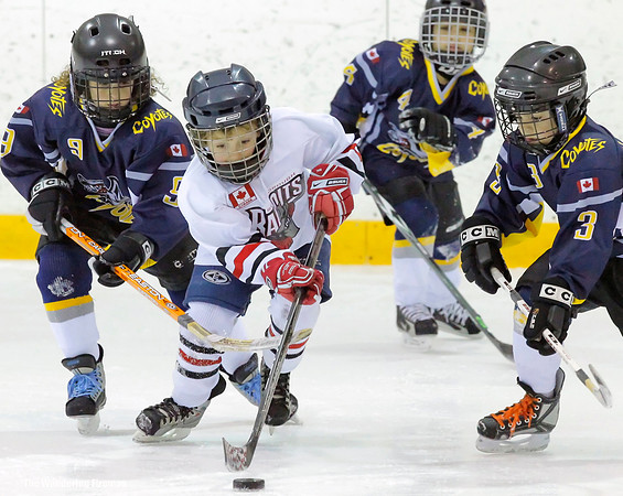 Chasing the puck in ice hockey