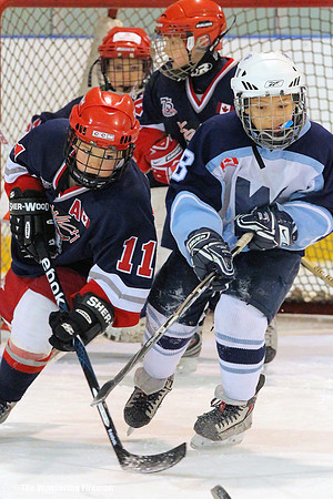 Chasing after the puck in ice hockey
