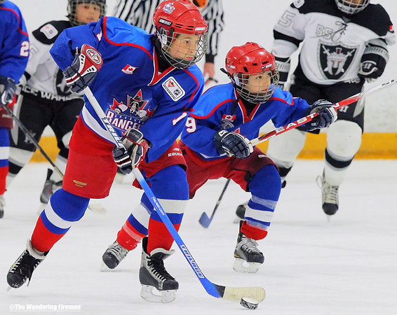 Chasing the puck in ice hockey