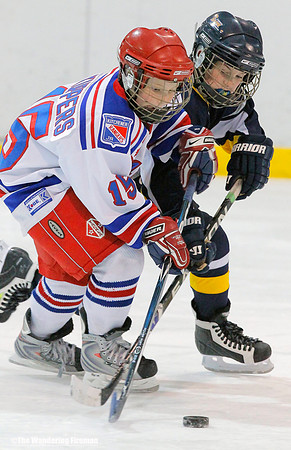 Batting for the puck in ice hockey