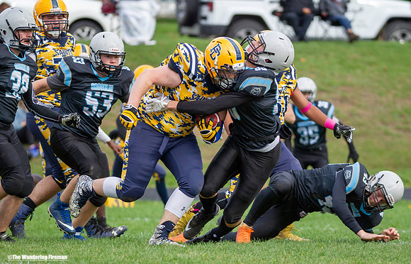 Tackling your opponent in boys football
