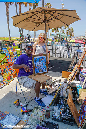 A street artist sells his wares