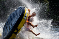 Flipping a tube on a joy ride behind a boat