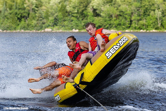 Flipping sideways off a tube being pulled behind a boat