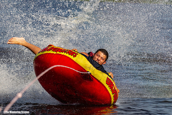 Tubing enjoyment behind a boat