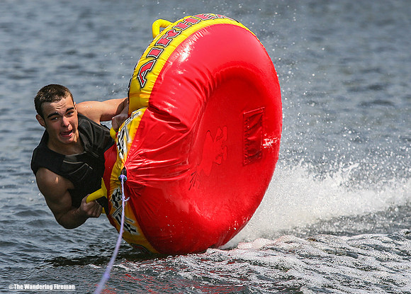 Flipping out on a tube being pulled by a boat