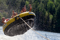 Catching massive air on a tube behind a boat