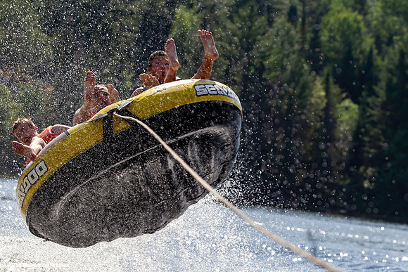 Catching massive air on a tube behind a boat