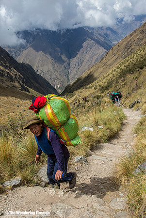 Porter carrying a load up to Dead Woman's Pass