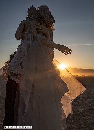 Sculpture of a woman on the playa at Burning Man
