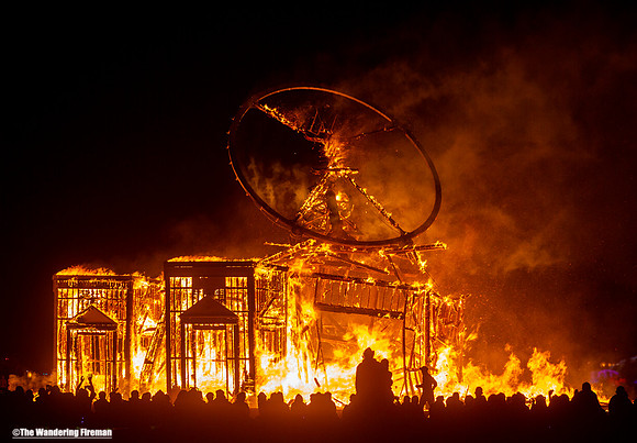 The "Man" falls in the Burning Man fire...