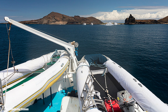 Boat sailing through the Galapagos islands