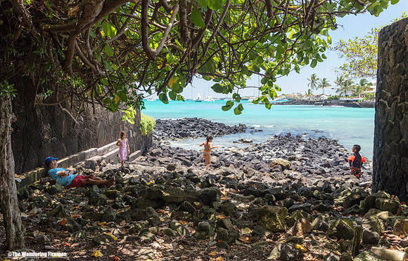 Kids playing in a vacant lot in Puerto Ayoro Galapagos Islands