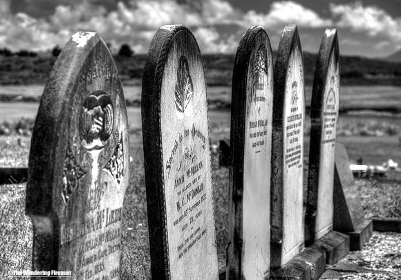 Monochrome image of headstones in a cemetary on the north island of New Zealand