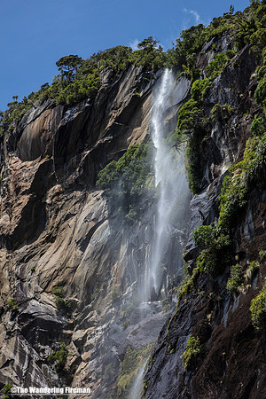 Waterfall in Milford Sound New Zealand 8