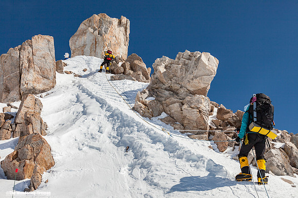 A mountain climber follows the path up the West Buttress ridge of Denali, Alaska, the highest mountain in North America