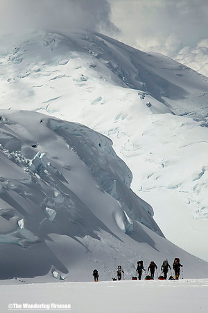 A rope team slogs the glacier on Denali, Alaska, the highest mountain i North America
