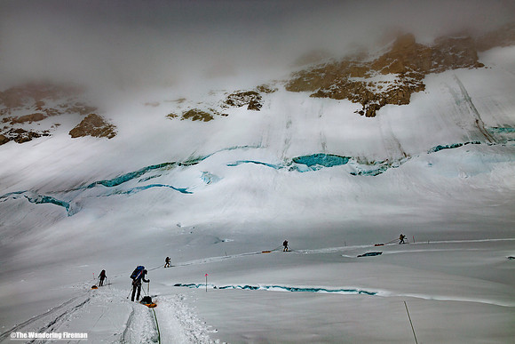Climbing around windy corner on Denali, Alaska, the highest mountain in North America