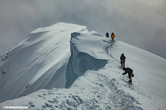 Descending along summit ridge of Denali, Alaska, the highest mountain in North Amereica