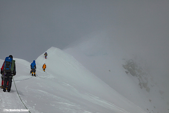 Snow blows over summit ridge of Denali, Alaska, the highest mountain in North America