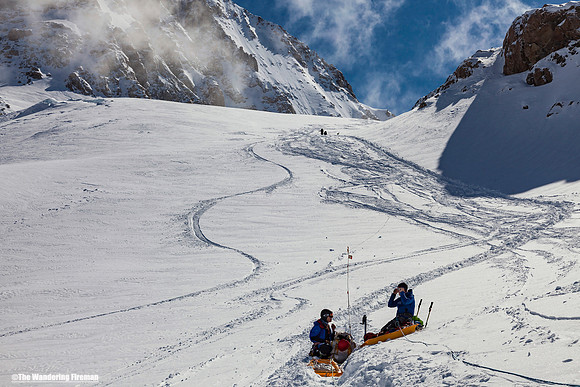 Taking a rest and eating break on Denali, Alaska, the highest mountain in North America