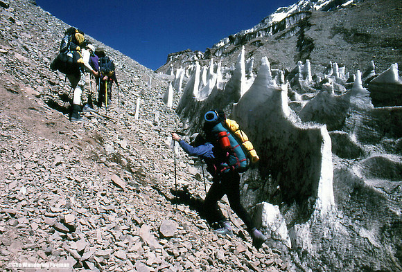 Hiking through the ice fomations leading to the summit of Aconcagua Argentina
