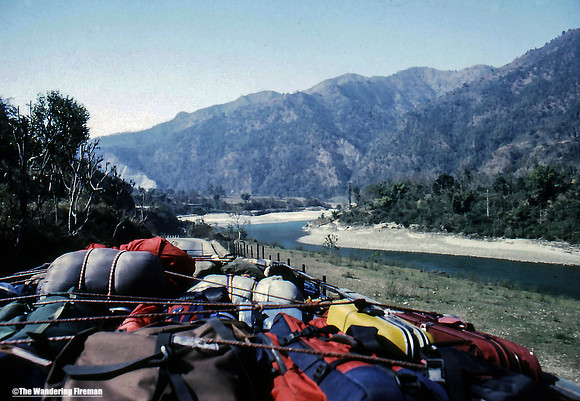 Riding atop a bus toward Pokhara in Nepal